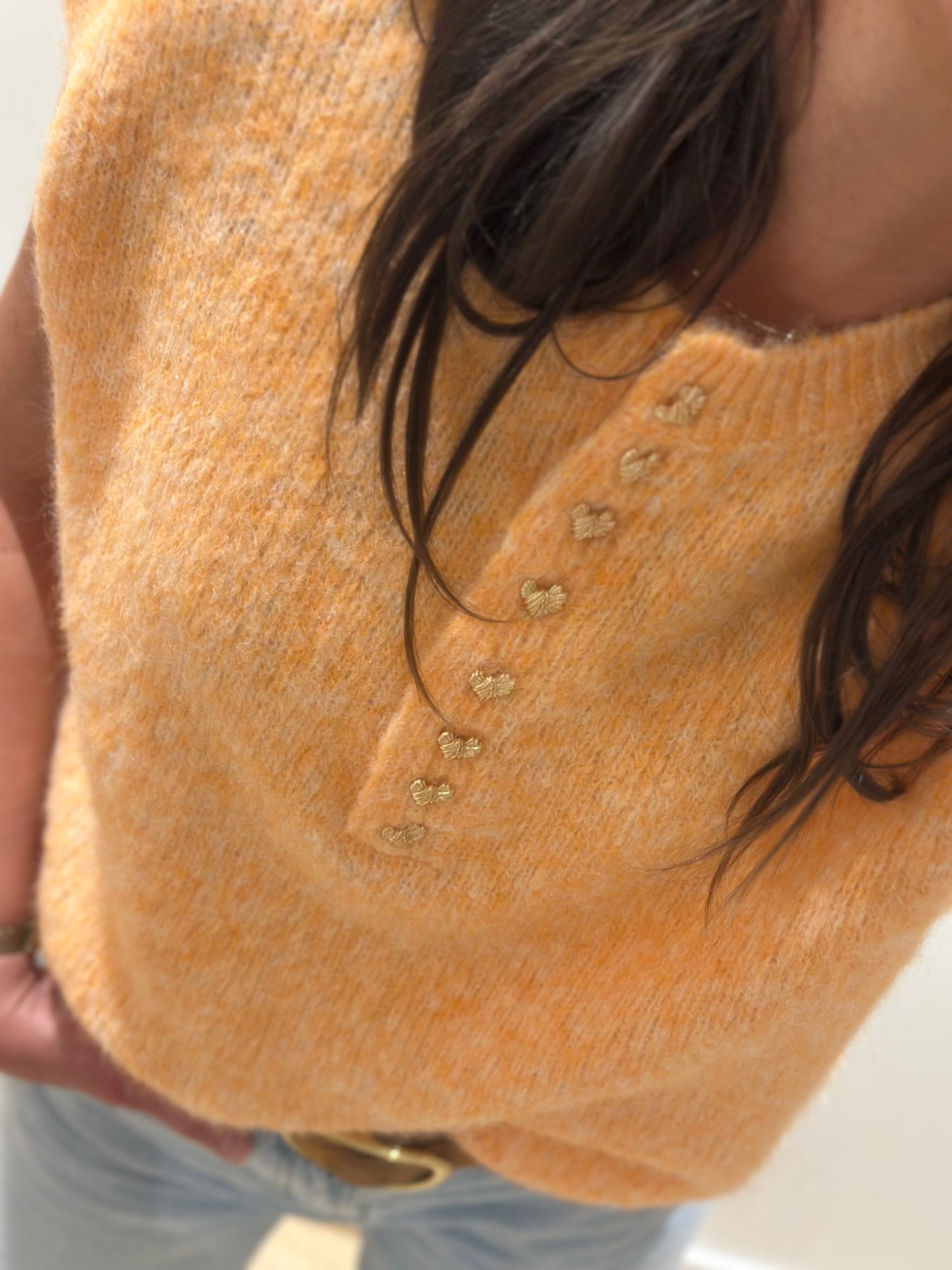 Maille coeur orange sans manches